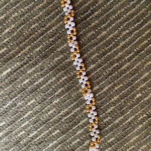 Elegant Gold and White Beaded Bracelet